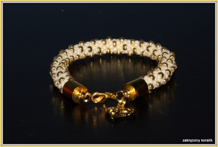 Wężowa bransoletka perłowo - złota